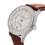 The Breitling Navitimer Automatic GMT 41 features a white dial, chronometer markings, date display, and a brown leather strap in a 41mm stainless steel case.