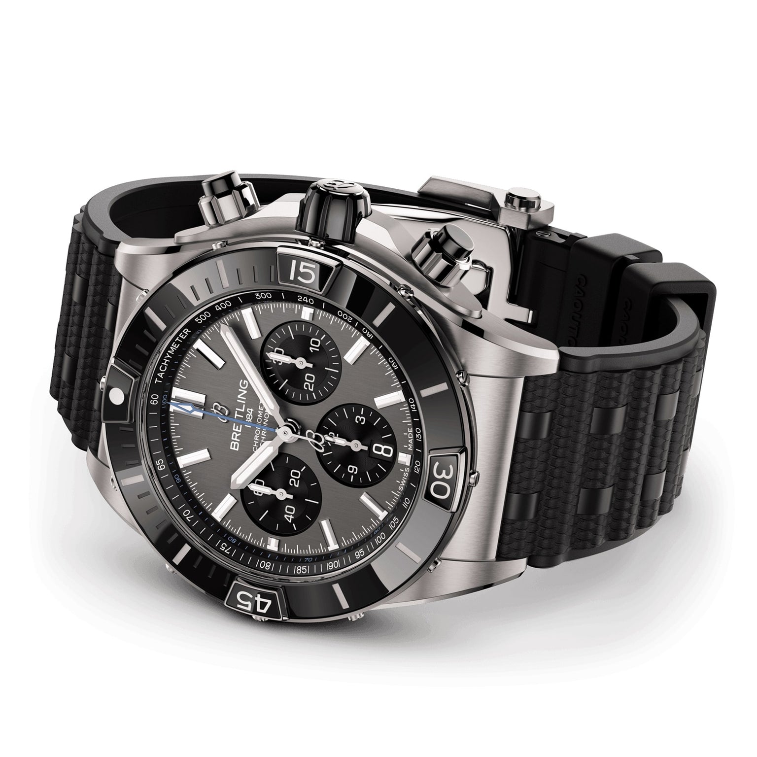 The Breitling Super Chronomat B01 44 is a stainless steel chronograph with a black bezel, three subdials, textured black rubber strap, tachymeter function, and is powered by the Breitling Manufacture 01 calibre movement.