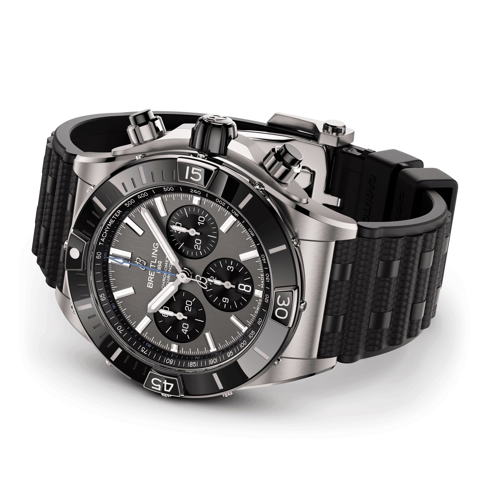 The Breitling Super Chronomat B01 44 is a stainless steel chronograph with a black bezel, three subdials, textured black rubber strap, tachymeter function, and is powered by the Breitling Manufacture 01 calibre movement.