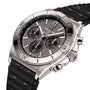 The Breitling Chronomat B01 42 is a stainless steel chronograph watch featuring a black textured rubber strap, three subdials, date display, silver hour markers, and the Breitling 01 calibre movement.