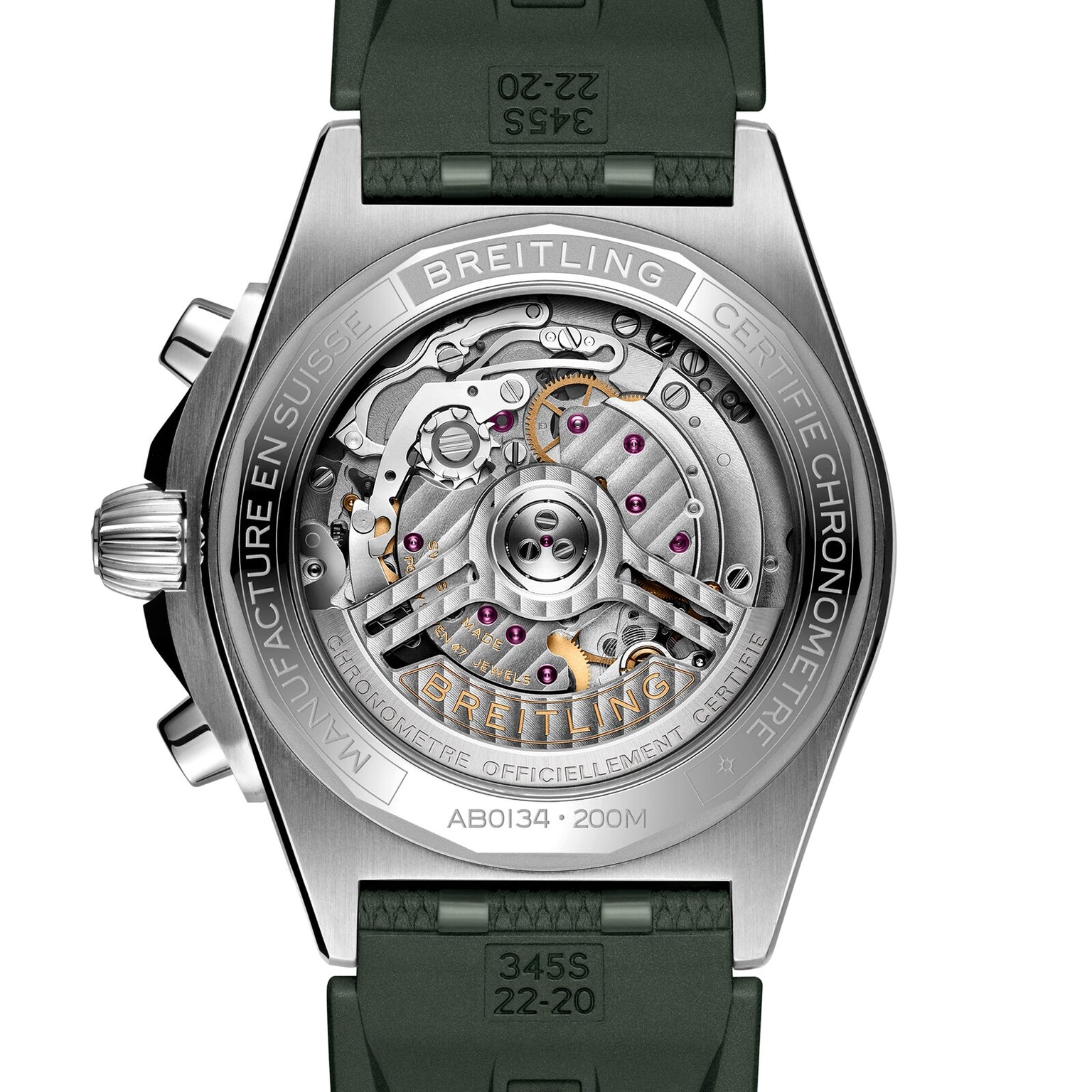 Close-up of the Breitling Chronomat B01 42’s back reveals its mechanical movement through a transparent case back, detailed engravings, and a green rubber strap.