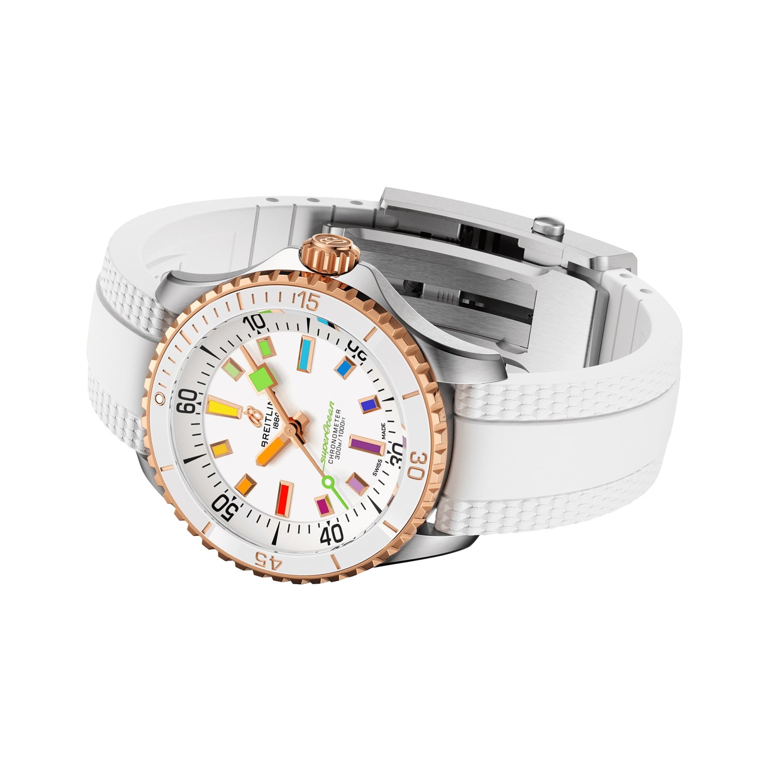 The Breitling Superocean Automatic 36 is a white 36mm stainless steel dive watch with a rose gold bezel, colorful hour markers, and a textured white band, displayed on a plain white surface.