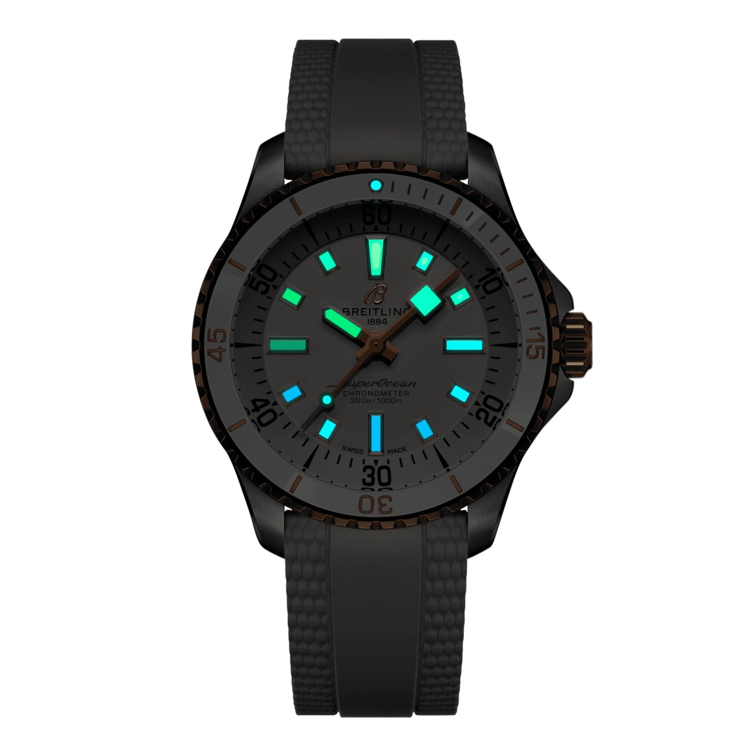 The Breitling Superocean Automatic 36 is a black dive watch with a 36mm stainless steel case, rubber strap, and illuminated blue and green hour markers and hands set against a dark background.