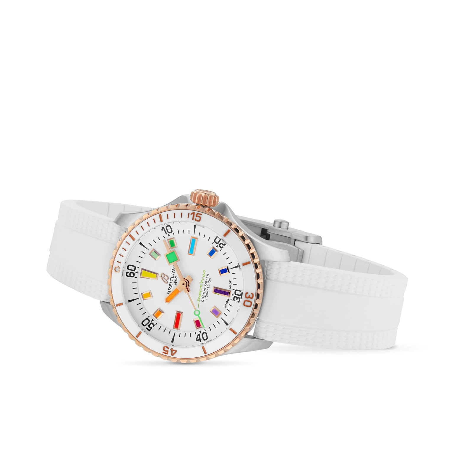 The Breitling Superocean Automatic 36 is a 36mm stainless steel watch with a white band, white face, rose gold accents, and multicolored hour markers, shown at an angle on a white background.