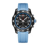 The Breitling Endurance Pro 44 is a black athleisure watch with a blue bezel, blue textured rubber strap, black dial with white numerals and subdials, all in a lightweight Breitlight case.