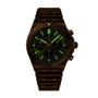 The Breitling Chronomat B01 42 Giannis Antetokounmpo is a limited edition chronograph wristwatch with a dark metal band and case, green dial, and illuminated markers and hands.