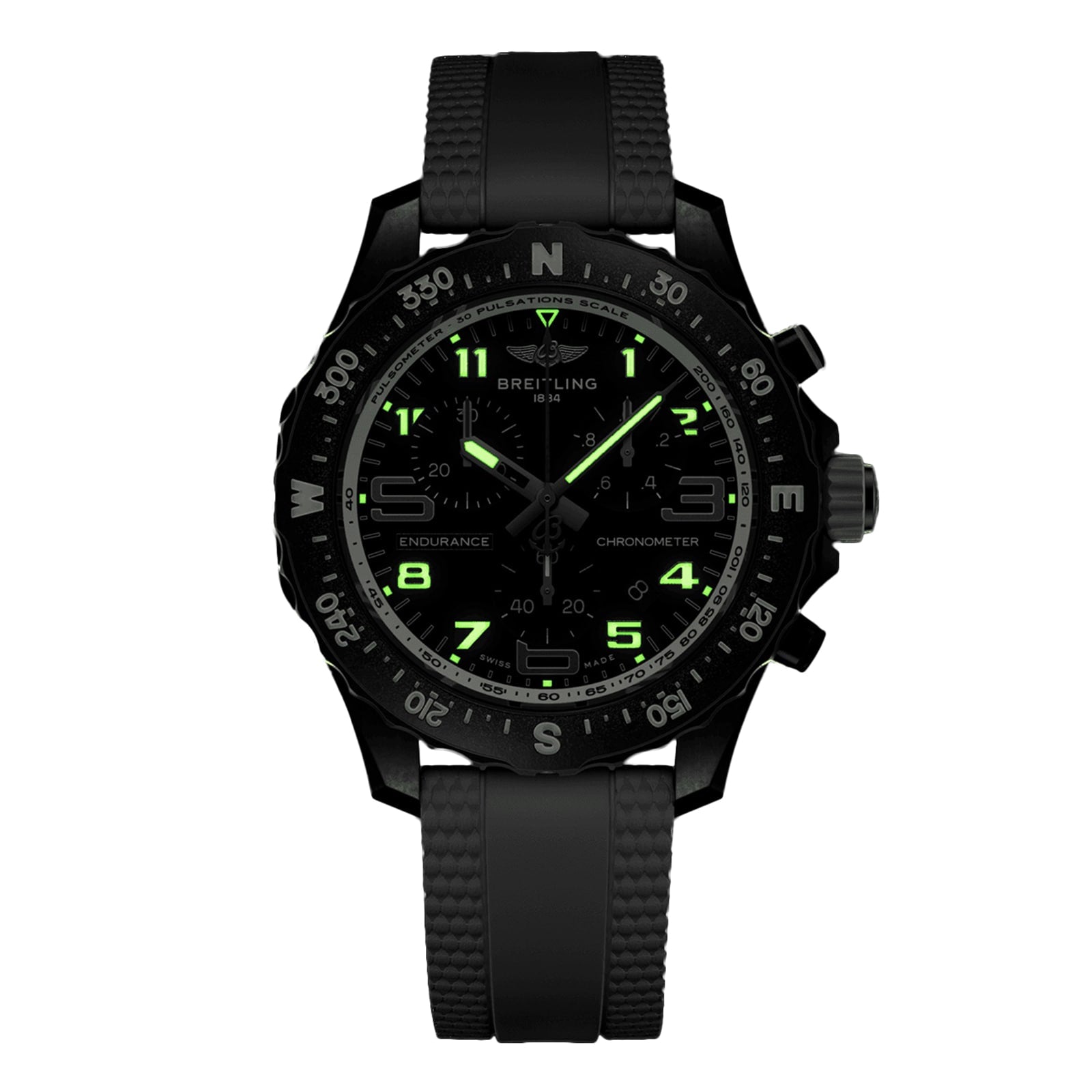 A black Breitling Endurance Pro 38 sports chronograph with neon green numerals, black rubber strap, Breitlight case, and compass bezel is shown on a white background.