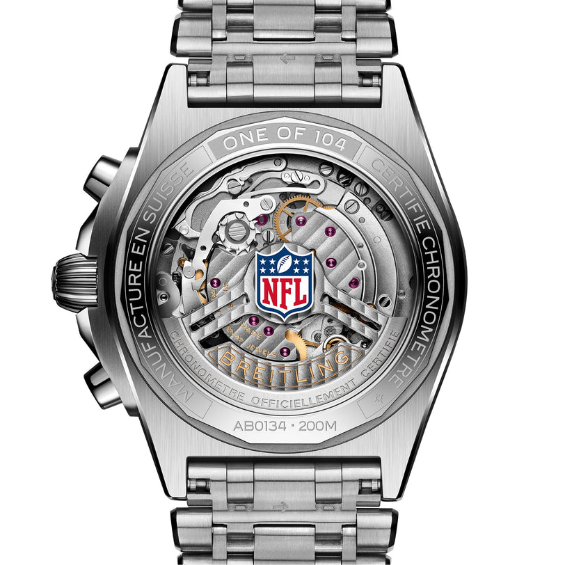 Back view of the Breitling Chronomat B01 42 NFL New England Patriots Edition featuring visible gears and an NFL logo on its transparent case back.