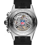 Close-up of the Breitling Chronomat B01 42 NFL New Orleans Saints Edition, showing visible gears, the NFL logo, and engraved markings on its metal and black rubber case back.