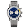 The Breitling Top Time B01 Gino Bartali is a stainless steel chronograph featuring a blue dial, two white subdials, yellow accents, silver mesh band, and iconic Breitling branding on the face.