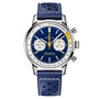 The Breitling Top Time B01 Gino Bartali features a blue leather strap, blue dial with white and yellow accents, two subdials, minute-marked bezel, and visible crown with pushers on the right.