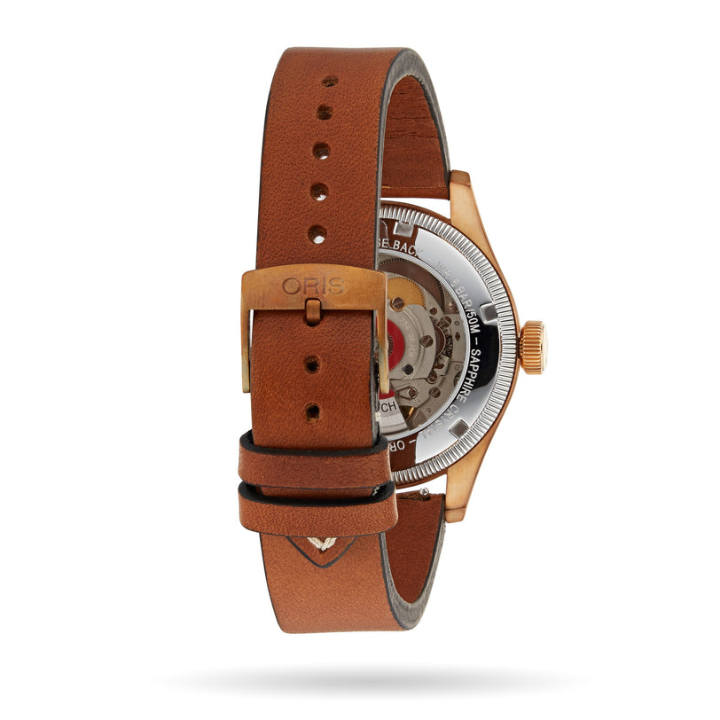 The Oris Big Crown Pointer Date 80th Anniversary Edition is a wristwatch with a brown leather strap, bronze buckle, green dial, transparent case back, and visible mechanical movement.