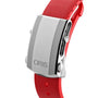 Close-up of the Oris Aquis Date Reliefs silver clasp on a red rubber strap, highlighting the detailed mechanism and embossed brand name—a signature touch from Oris.