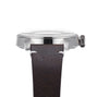 Side view of the Oris Big Crown Oris X Cervo Volante, showcasing a silver case, fluted bezel and crown, along with a brown textured leather strap with white stitching—designed for professional pilots.