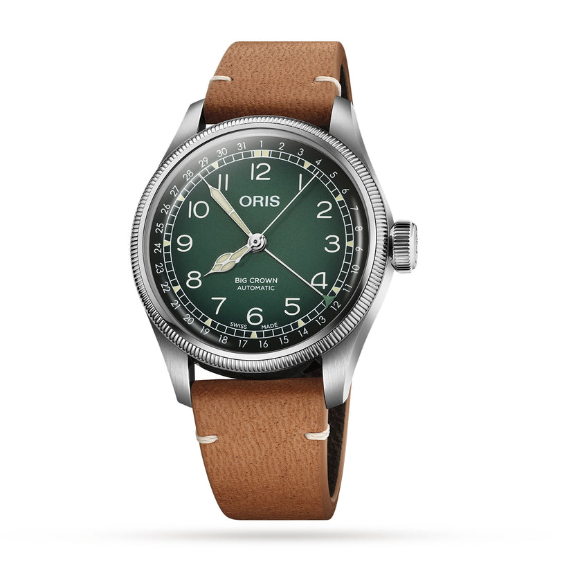 An Oris Big Crown Oris X Cervo Volante wristwatch with a stainless steel case, green dial, white numerals, and brown leather strap is shown against a white background.