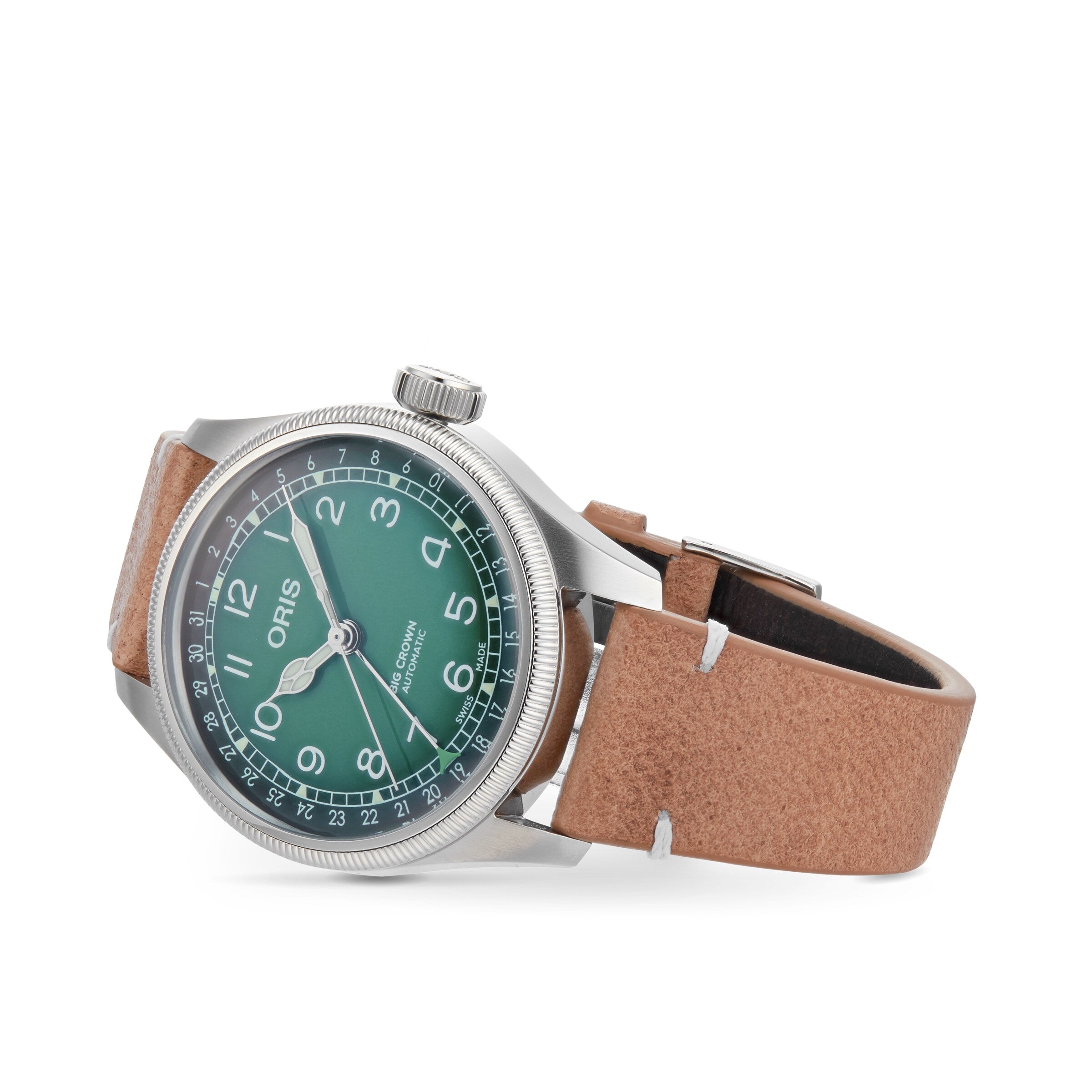 The Oris Big Crown Oris X Cervo Volante features a stainless steel case, green dial with white numerals, and a brown leather strap, displayed against a white background.