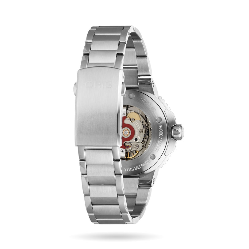 The Oris Aquis Date Relief is a stainless steel wristwatch with an exhibition case back that showcases the mechanical movement and engraved details, paired with a metal bracelet and clasp.