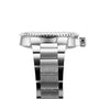Side view of an Oris Aquis Date Relief wristwatch with a stainless steel bracelet and textured bezel, showcasing the watch’s thickness, crown design, and its precise mechanical movement.