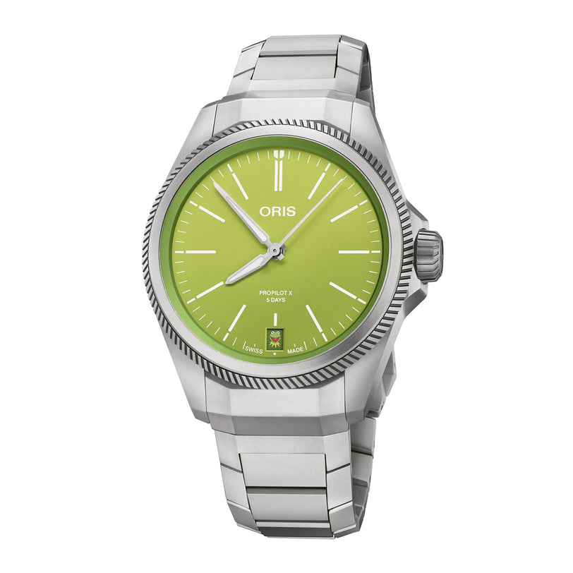 The Oris ProPilot X Kermit Edition is a stainless steel watch with a green dial, silver markers and hands, a date display at 6 o’clock, and the Oris logo on the dial for a playful yet refined look.