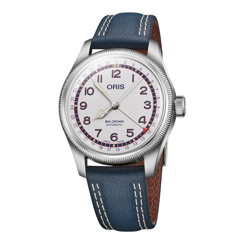 The Oris Big Crown Hank Aaron Limited Edition features a stainless steel case, white dial with Arabic numerals, blue hands, and a blue leather strap with white stitching.