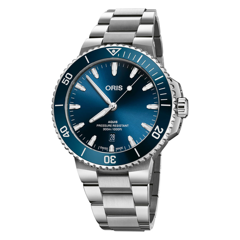 Oris Aquis Date dive watch with blue dial, silver markers, rotating bezel, and metal bracelet—an iconic stainless steel model from Oris—shows the time as 10:12.