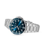 The Oris Aquis Date is a stainless steel diving watch with a blue dial and bezel, white hour markers, and a metal link bracelet—an elegant timepiece from the renowned Oris brand, shown against a white background.