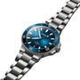 An Oris Aquis Date Calibre 400 stainless steel wristwatch with a blue dial and silver bracelet, displayed at an angle.