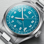 A close-up of the Oris Big Crown Pointer Date wristwatch in silver, featuring a blue dial with white numerals, displaying the time at 4:42.