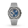 The Zenith Defy Extreme is a stainless steel wristwatch with a titanium case, blue chronograph subdials, skeleton accents, and a textured bezel, displayed against a plain white background.
