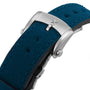 Close-up of a stainless steel Zenith Chronomaster Sport buckle with star engraving, fitted to a textured teal fabric strap—an elegant accent befitting this automatic chronograph.