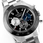 A Zenith Chronomaster Sport stainless steel chronograph watch with a black dial and three subdials, shown in close-up.