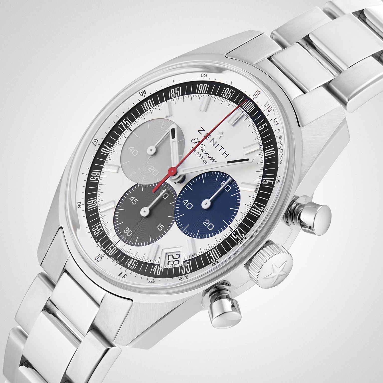 The Zenith Chronomaster EP Original features a silver case, white dial with grey, blue, and black subdials inspired by the A386, a date window at 6 oclock, and a stainless steel bracelet.