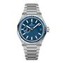 The Zenith Defy Skyline Sapphire wristwatch features a blue textured dial, silver hour markers, a date window at 3 o’clock, and a metal link bracelet, combining elegance and precision with the El Primero 3620 movement.