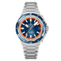 The Zenith Defy Extreme Diver is a stainless steel wristwatch featuring a blue and orange bezel, blue dial, silver hour markers, date window at 3 o’clock, El Primero automatic movement, and metal bracelet.