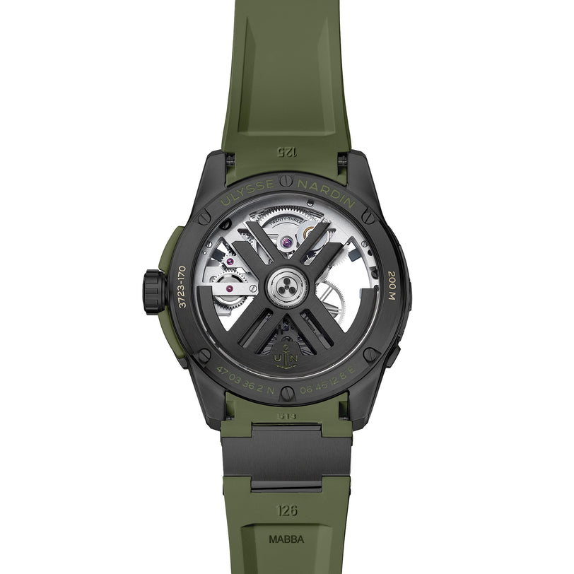 Back view of the Ulysse Nardin Diver X Skeleton OPS, showcasing its intricate mechanical movement through a transparent case back and paired with a distinctive green strap.