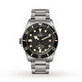 The TUDOR Pelagos LHD divers watch features a stainless steel case, black bezel and dial with luminous markers, date display at 3 oclock, and is shown on a metal bracelet against a white background.