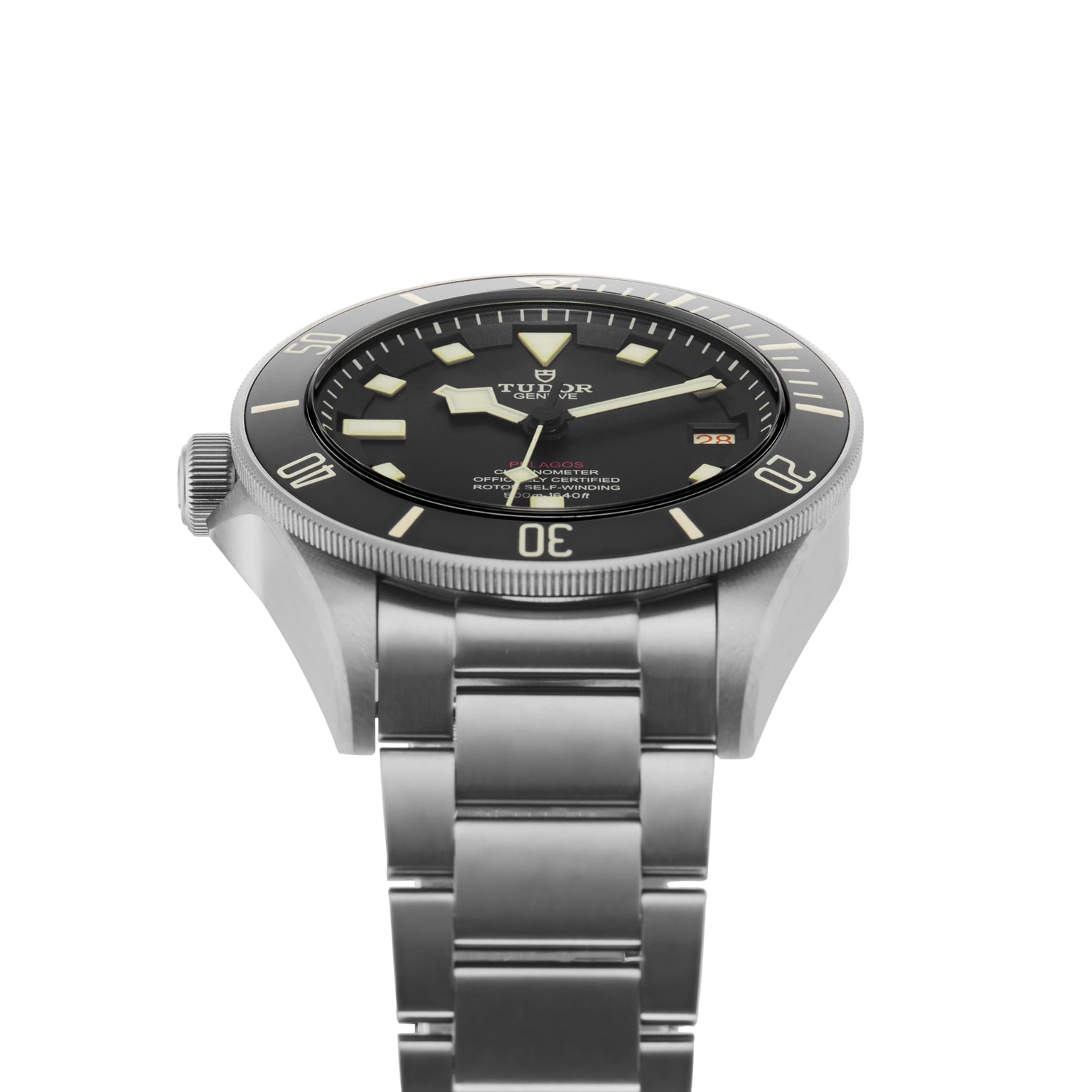 A TUDOR Pelagos LHD stainless steel wristwatch with black dial, luminous hands and markers, and metal bracelet, shown from a slightly angled front view.
