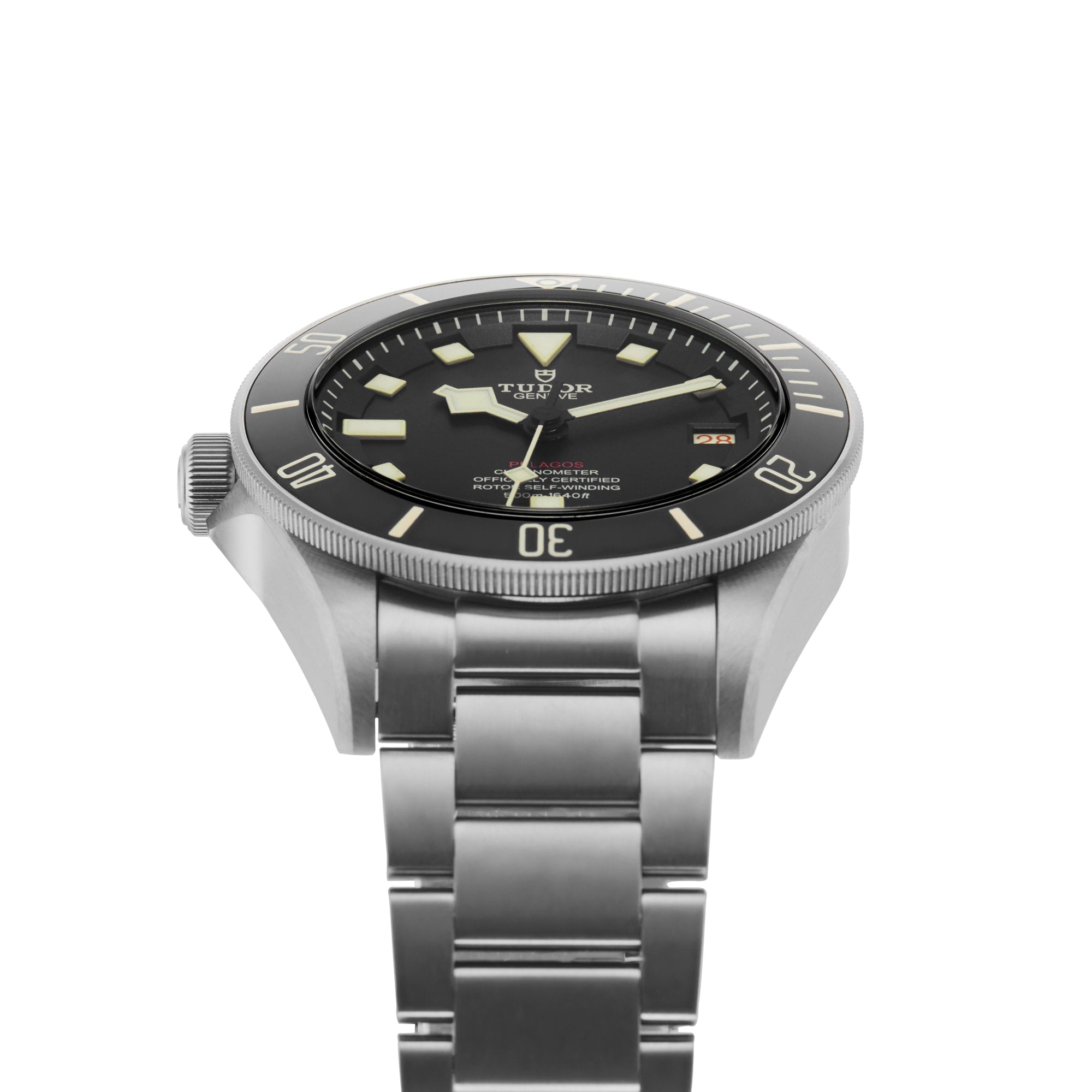 A TUDOR Pelagos LHD stainless steel wristwatch with black dial, luminous hands and markers, and metal bracelet, shown from a slightly angled front view.