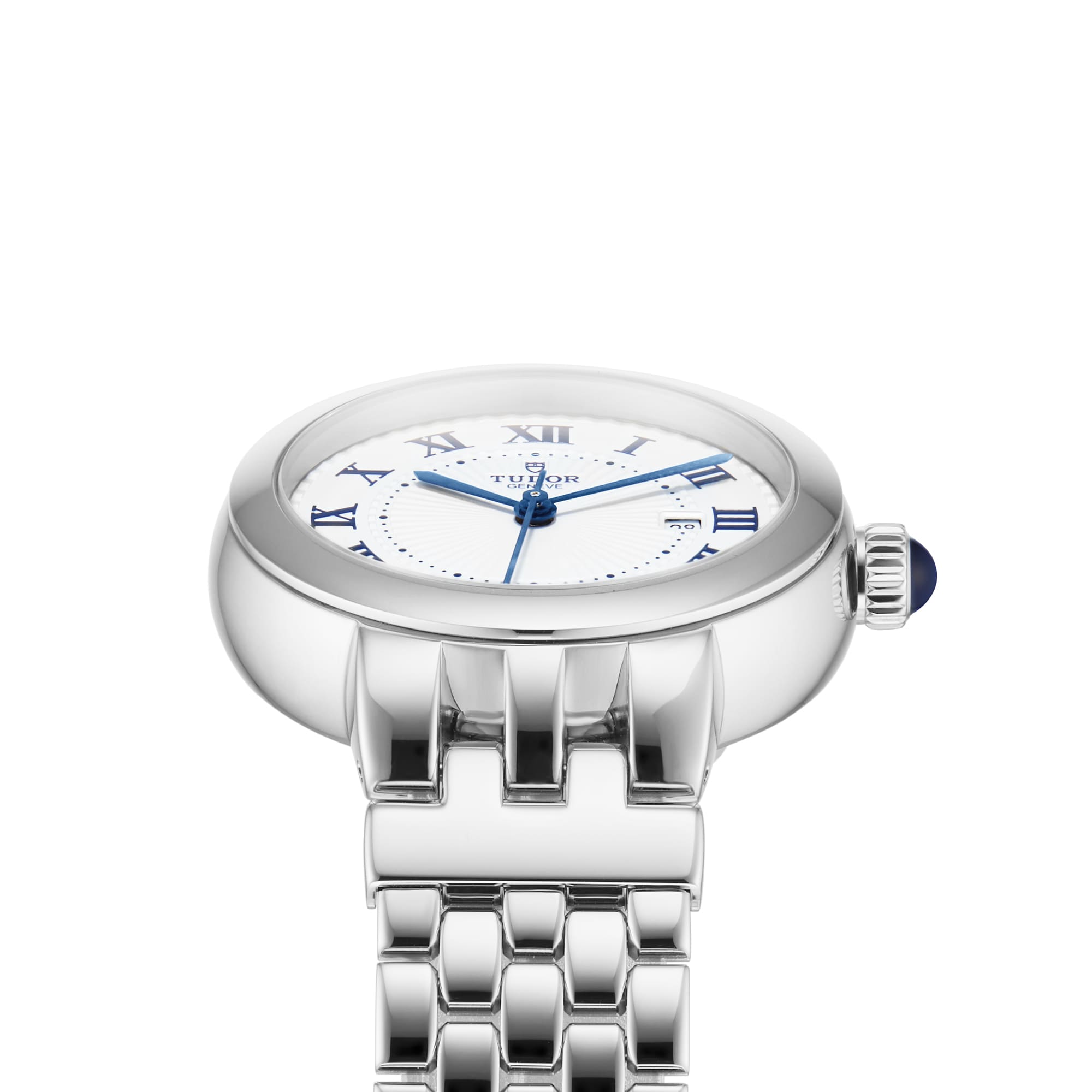 The TUDOR Clair de Rose wristwatch features a white dial with blue Roman numerals and hands, and a stainless steel bracelet.