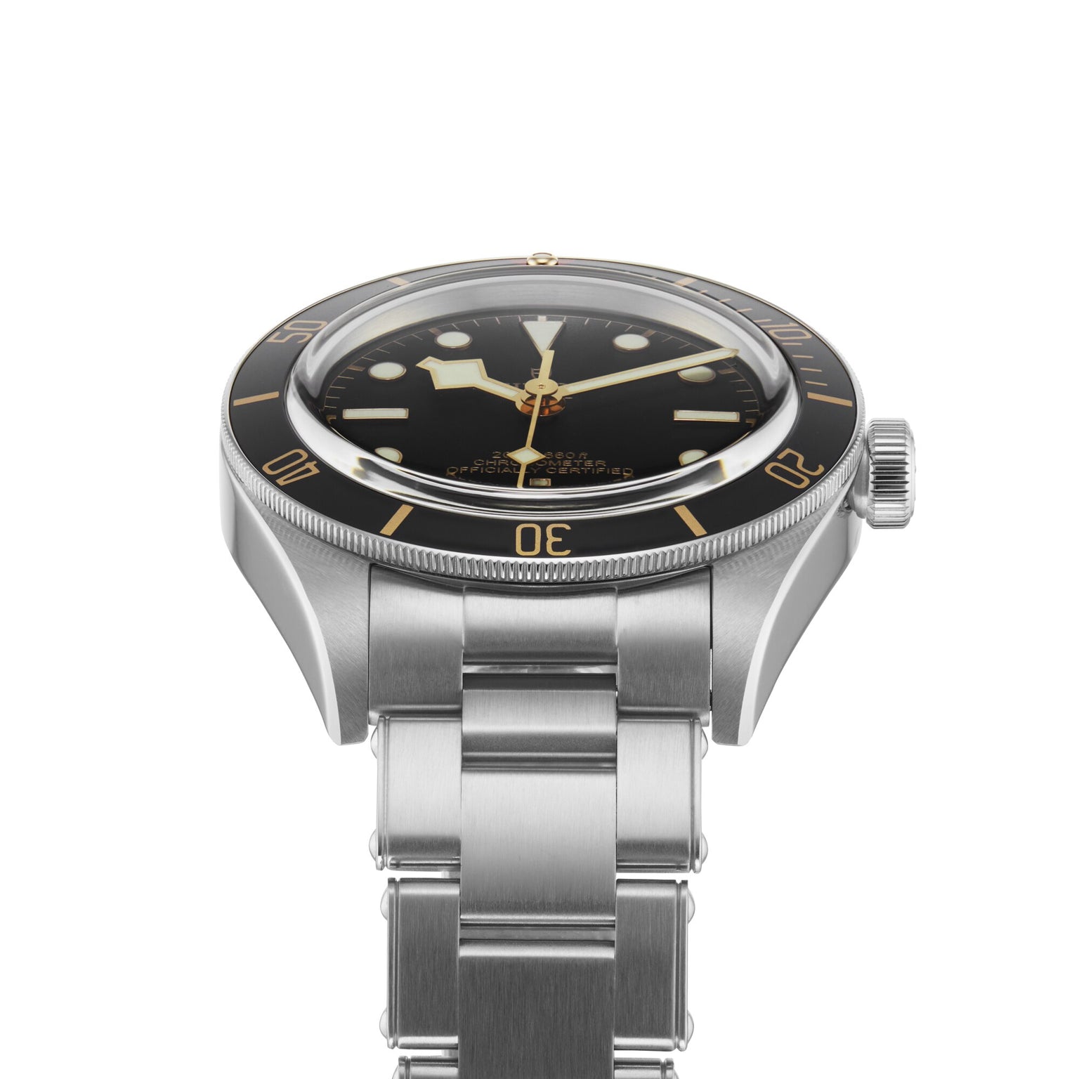 The TUDOR Black Bay 58, a vintage-inspired stainless steel wristwatch with a black bezel and dial, silver hour markers, and metal bracelet, evokes the timeless appeal of classic diving watches.