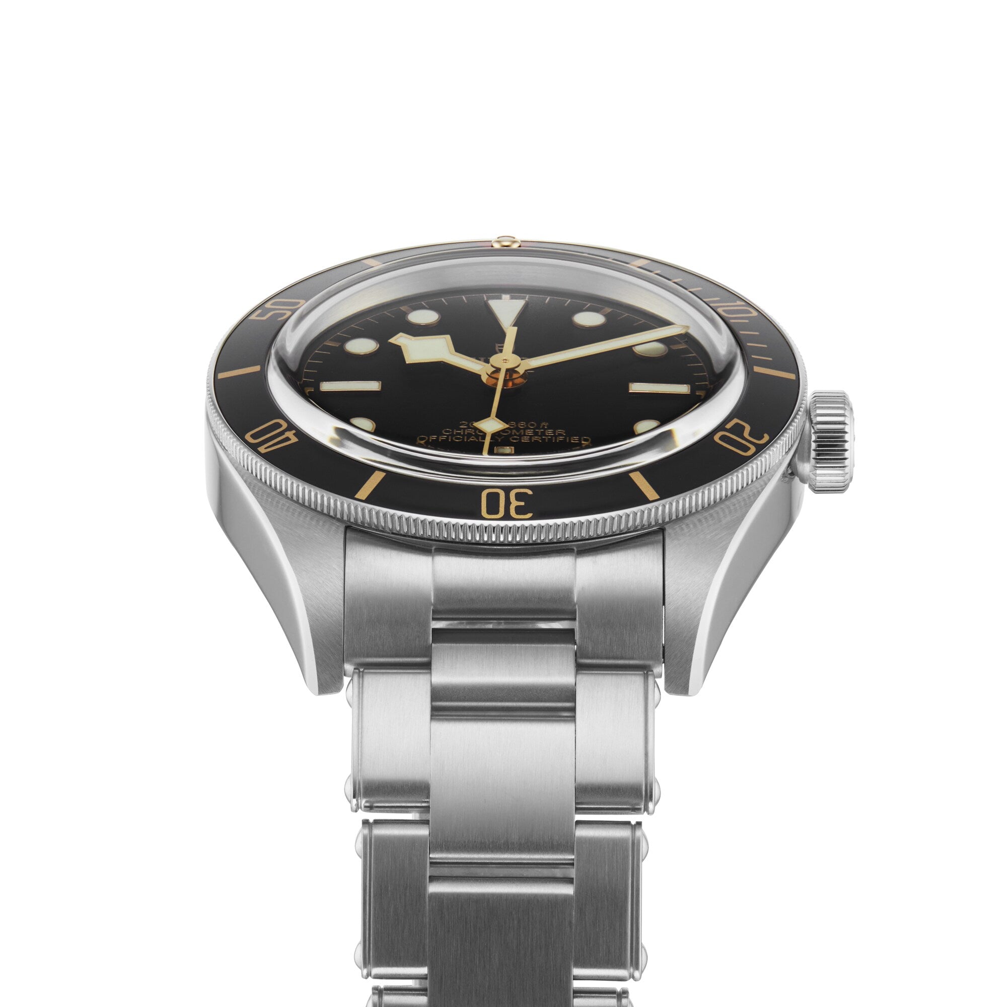 The TUDOR Black Bay 58, a vintage-inspired stainless steel wristwatch with a black bezel and dial, silver hour markers, and metal bracelet, evokes the timeless appeal of classic diving watches.