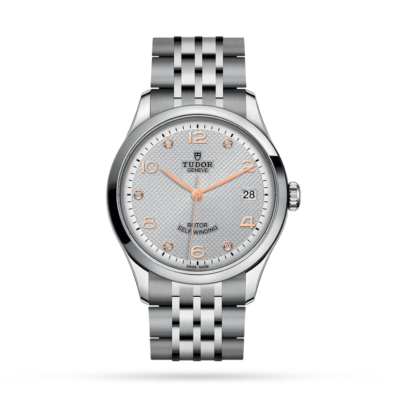 TUDOR 1926 wristwatch featuring a textured white dial, rose gold markers, and a silver metal link bracelet.