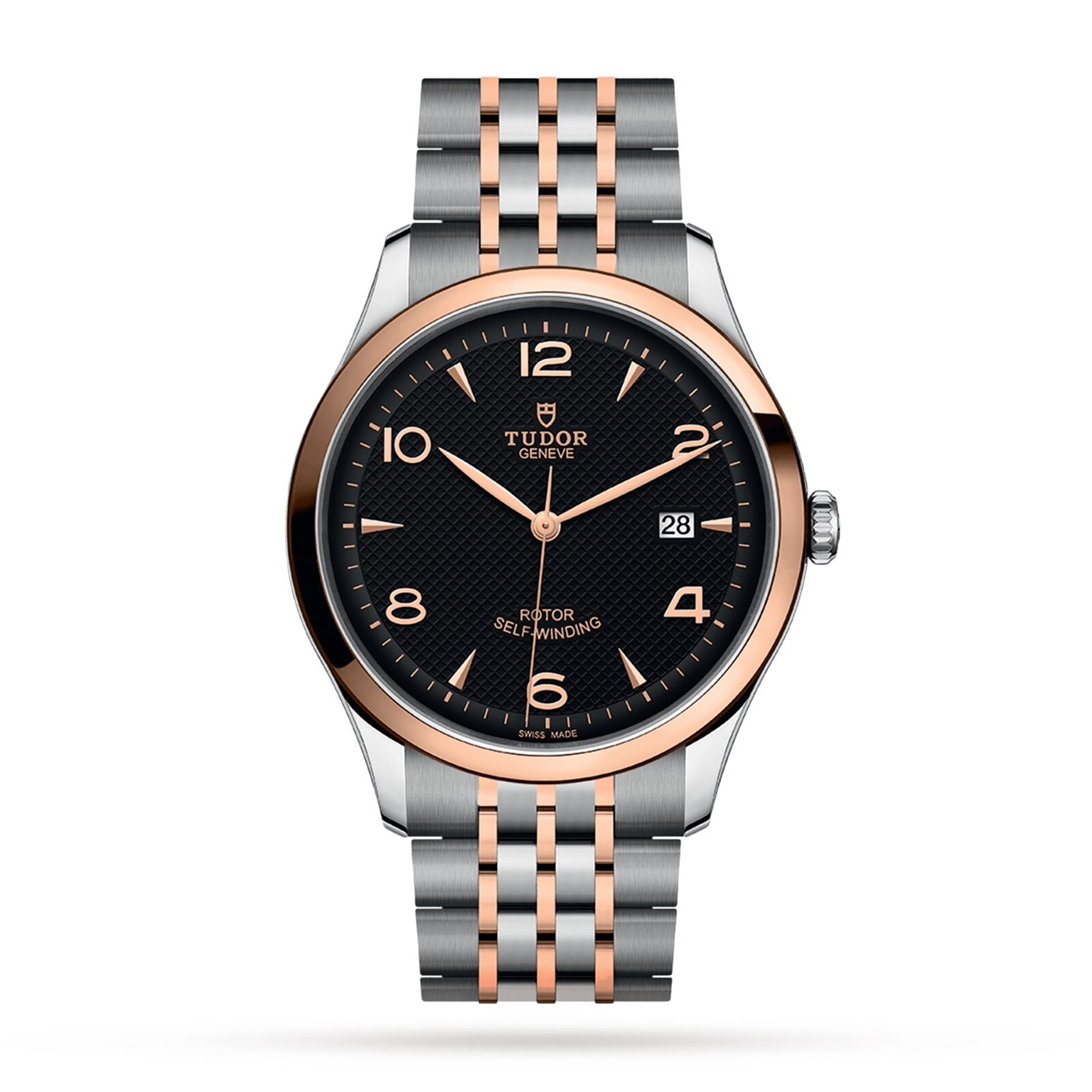 The TUDOR 1926 is a two-tone wristwatch with a black dial, gold accents, date display, and metal bracelet.
