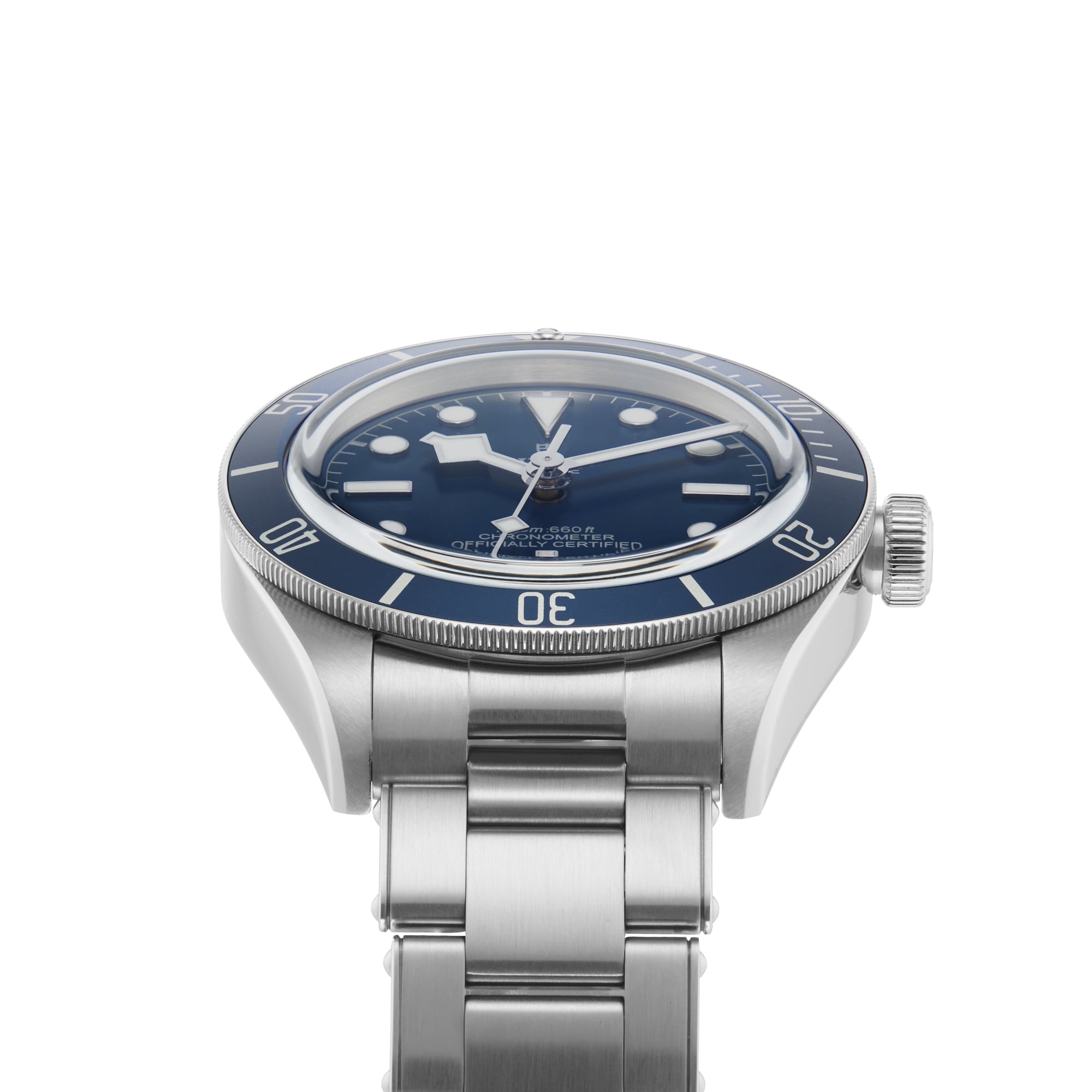 A TUDOR Black Bay 58 watch with a blue bezel and dial, stainless steel case, metal link band, and luminous hour markers is shown against a white background—an exceptional choice for any diving watch collection.