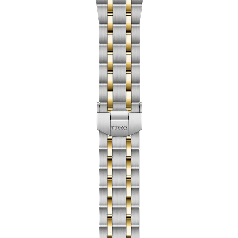 The TUDOR Royal bracelet features a clasp and alternating gold and stainless steel links, designed to complement TUDOR’s contemporary watch collections.