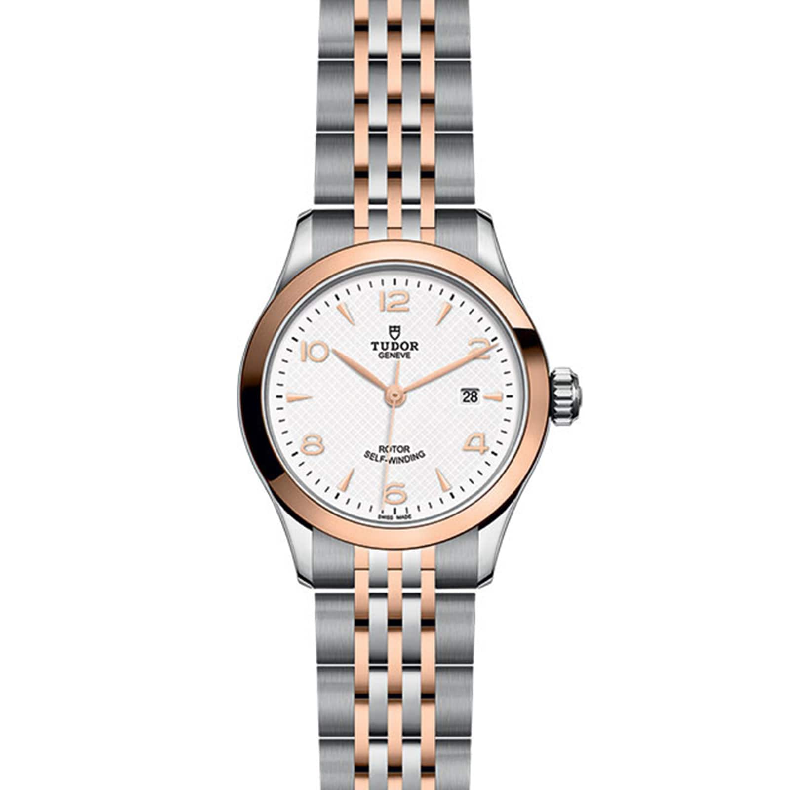The TUDOR 1926 wristwatch features a white dial, gold bezel, two-tone metal bracelet, and date display at 3 o’clock—a refined choice for collectors of sophisticated mechanical watches.
