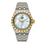 The TUDOR Royal features a two-tone silver and gold integrated bracelet, a white mother-of-pearl dial with gold Roman numerals, diamond hour markers, and a date window at 3 oclock—offering timeless elegance and technical excellence.
