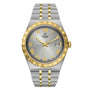 The TUDOR Royal is a two-tone automatic sport-chic watch featuring a silver and gold bracelet, silver dial, gold Roman numerals, date at 3 o’clock, and a gold fluted bezel—reflecting classic Rolex-inspired elegance.