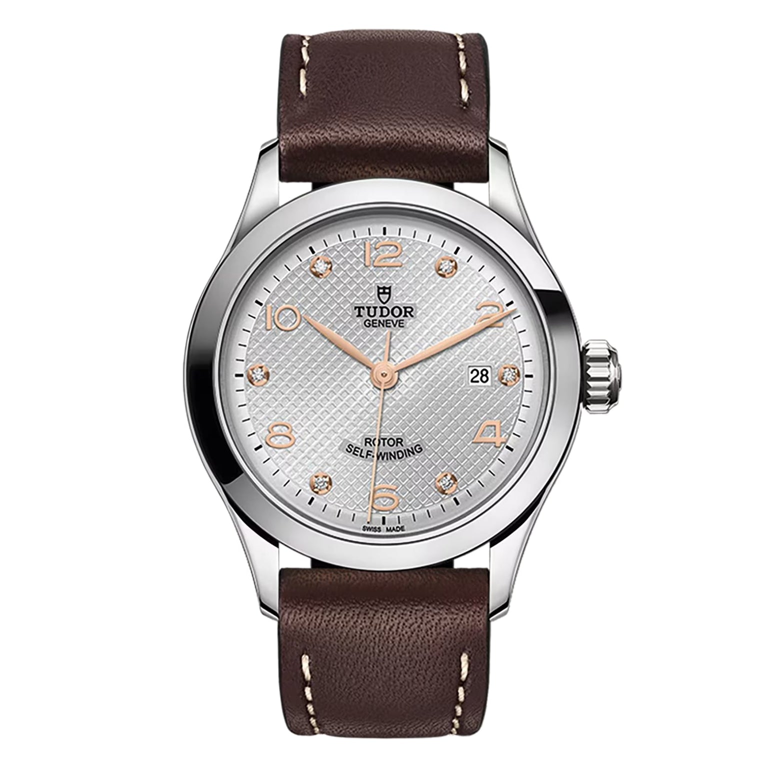 A silver TUDOR 1926 wristwatch with a textured dial, gold numerals, date display, and brown leather strap is shown on a white background.