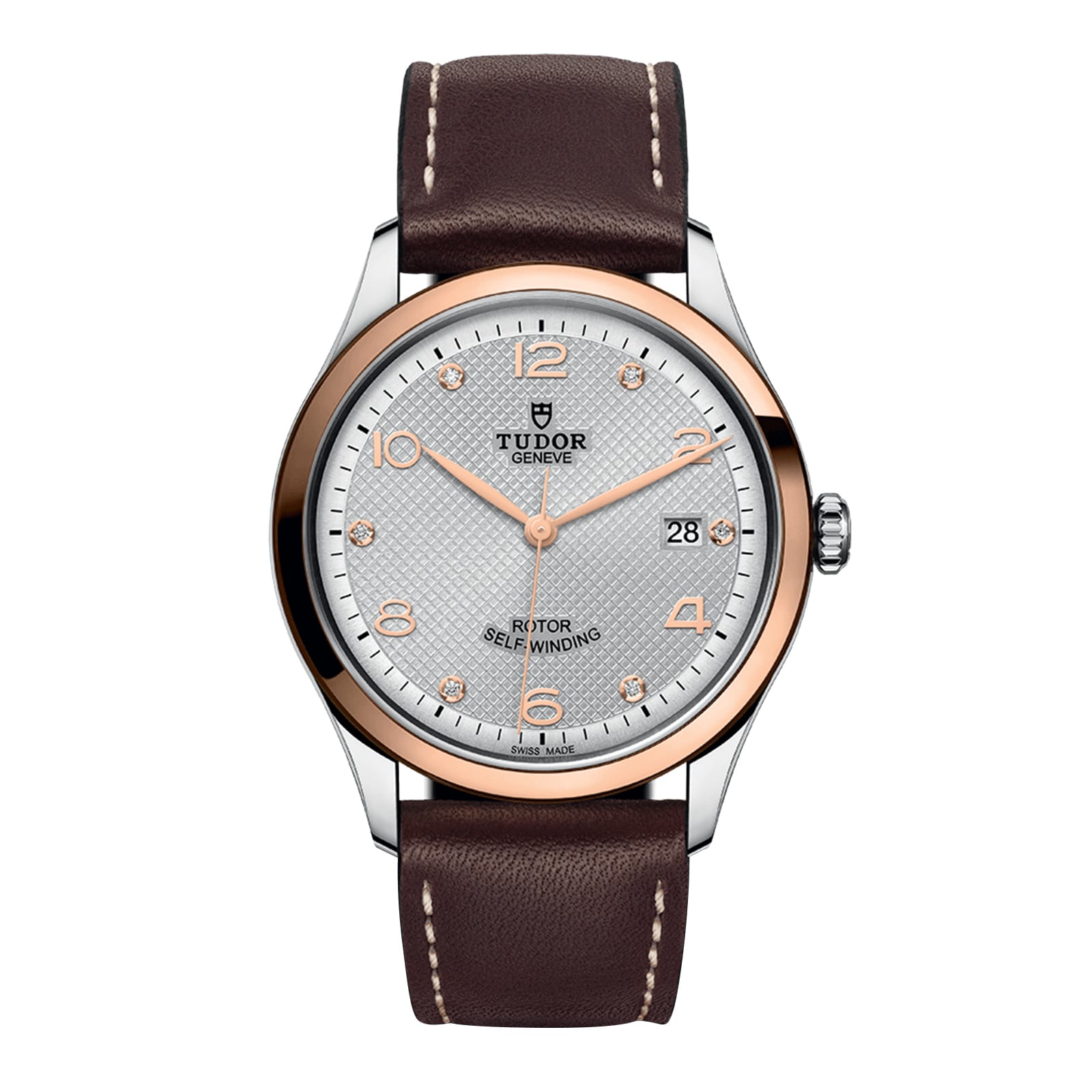 The TUDOR 1926 wristwatch features a brown leather strap, gold bezel, and silver textured dial with date display.
